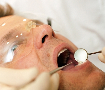 Dr. Stewart South Lakewood Dental Providing Implant Support Denture